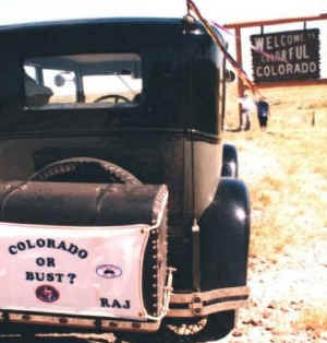 "Colorado or Bust" banner at the Colorado state line