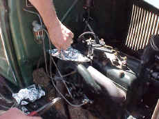 Lyle Meek wiring our lunch to the manifold